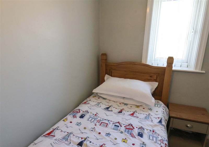 This is a bedroom (photo 5) at Floraville, Cayton Bay