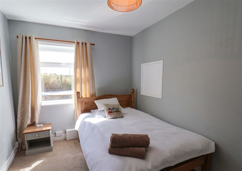 This is a bedroom at Floraville, Cayton Bay