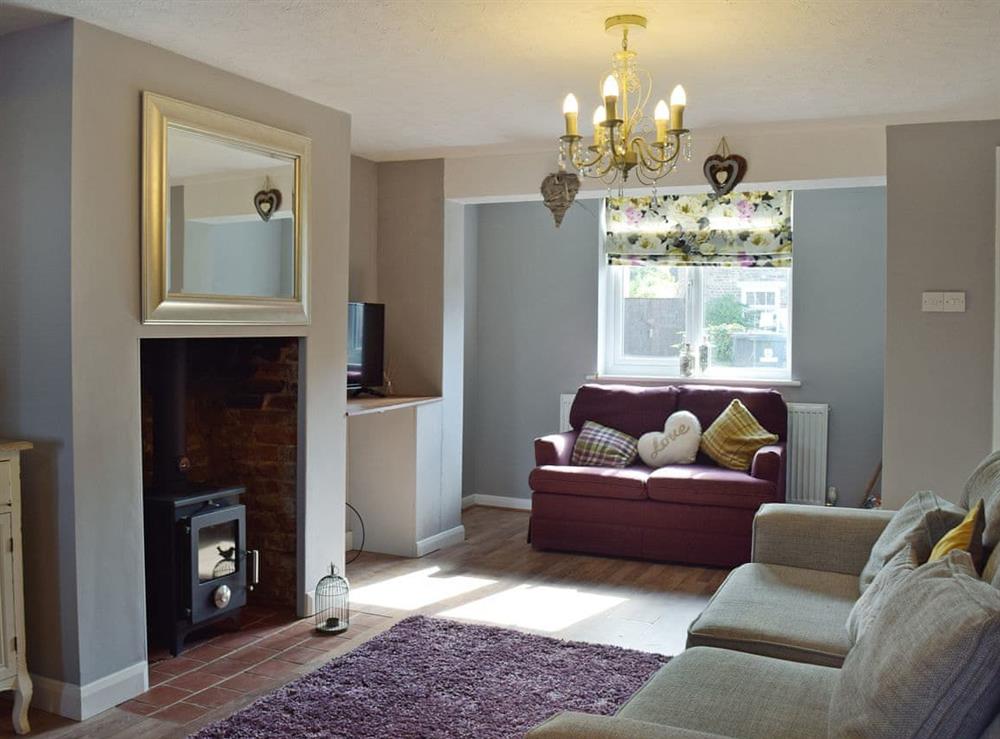 Stylishly furnished living/dining room at Florence Cottage in Pakefield, near Lowestoft, Suffolk