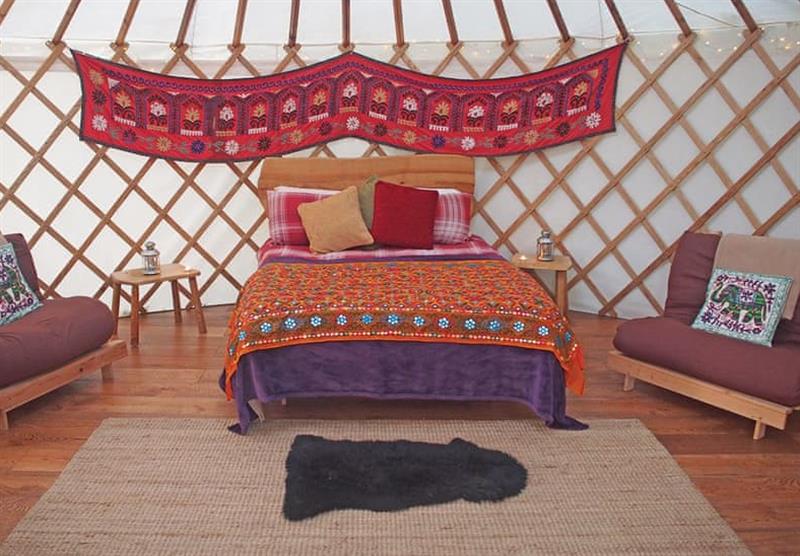 Bedroom in the Florence Spring Yurt at Florence Springs Glamping in St Florence, Tenby