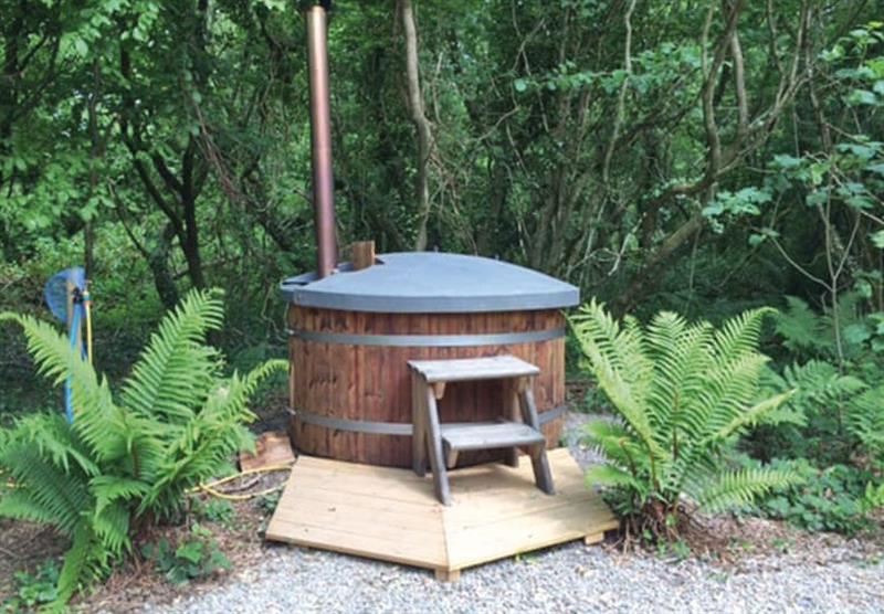 Wood fired hot tub in the Florence Spring Hobbit House at Florence Springs Glamping in St Florence, Tenby