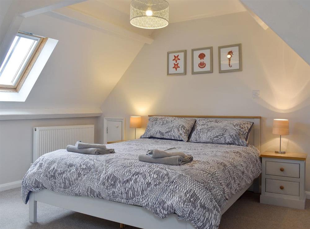 Relaxing en-suite master bedroom at Flowergate House in Whitby, North Yorkshire