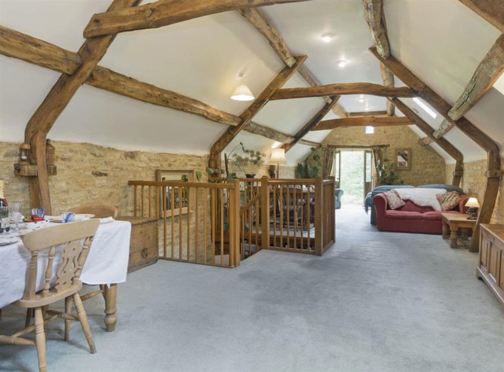 Thoughtfully renovated living/dining room (photo 2) at Flowers Barn in Middle Duntisbourne, near Cirencester, Gloucestershire