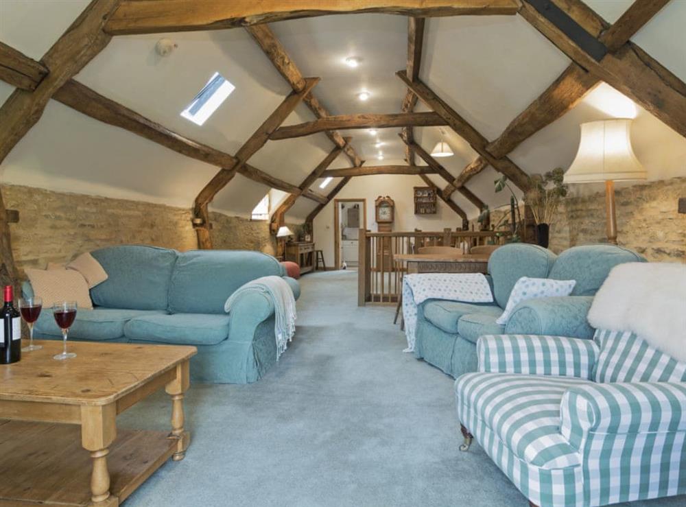 Thoughtfully renovated living/dining room at Flowers Barn in Middle Duntisbourne, near Cirencester, Gloucestershire