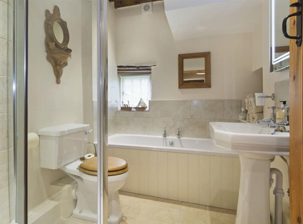 Well presented bathroom with shower cubicle at Flowers Barn in Middle Duntisbourne, near Cirencester, Gloucestershire