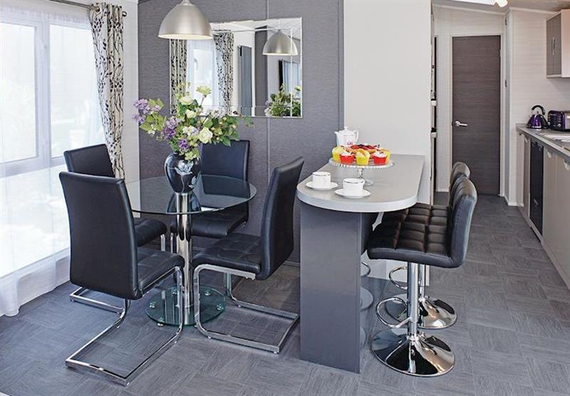 Dining area in the Eamont Premier at Flusco Wood in Flusco, Nr Penrith