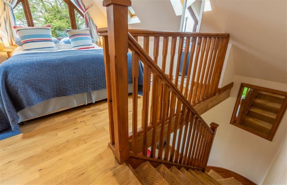 First floor: Bedroom opens up at the top of the stairs at Focsle, Wiveton  near Holt