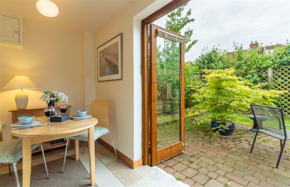Ground floor: Dining room has doors  to the garden  at Focsle, Wiveton  near Holt