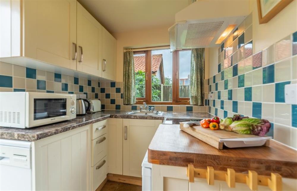 Ground floor: Kitchen is compact but well equipped at Focsle, Wiveton  near Holt