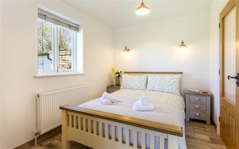 Bedroom 1 on the ground floor has a 4ft 6inch double bed at Folly in Bridport