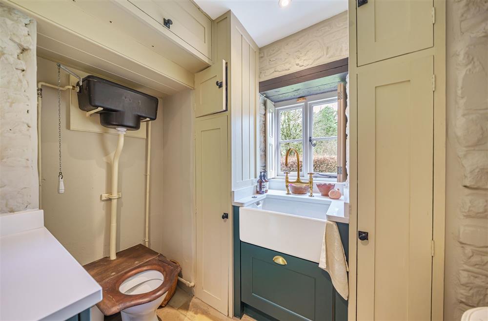 The cloakroom with original features at Ford Cottage, Corscombe