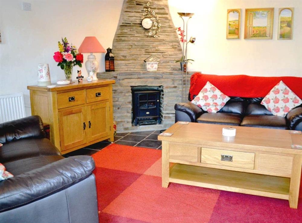 Living room at Fordbrook Cottage in Brixton Torr, Devon