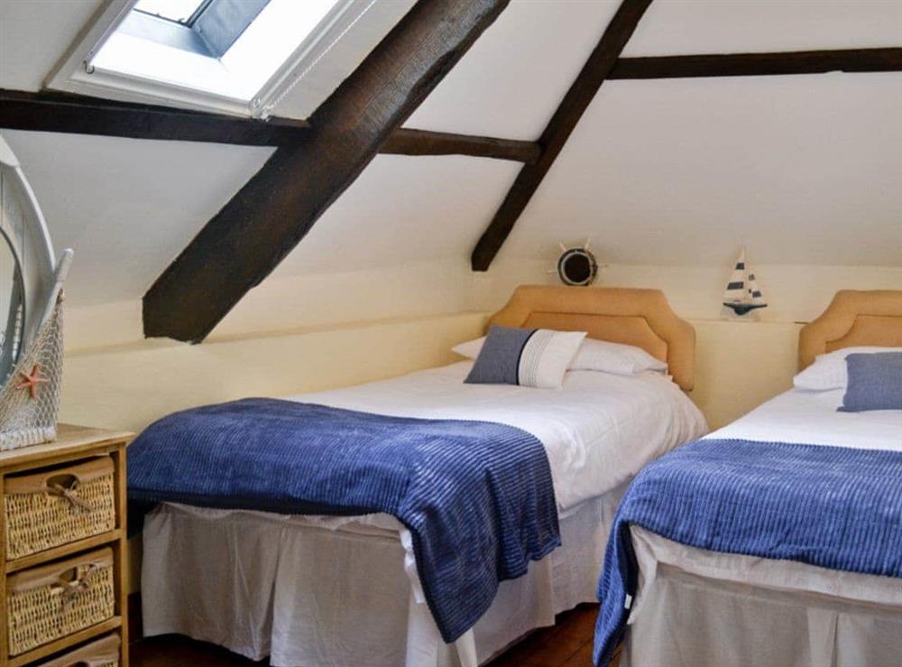Twin bedroom at Fordbrook Cottage in Brixton Torr, Devon