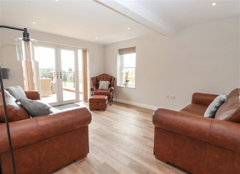 Relax in the living area at Foremans Cottage, Winestead near Withernsea