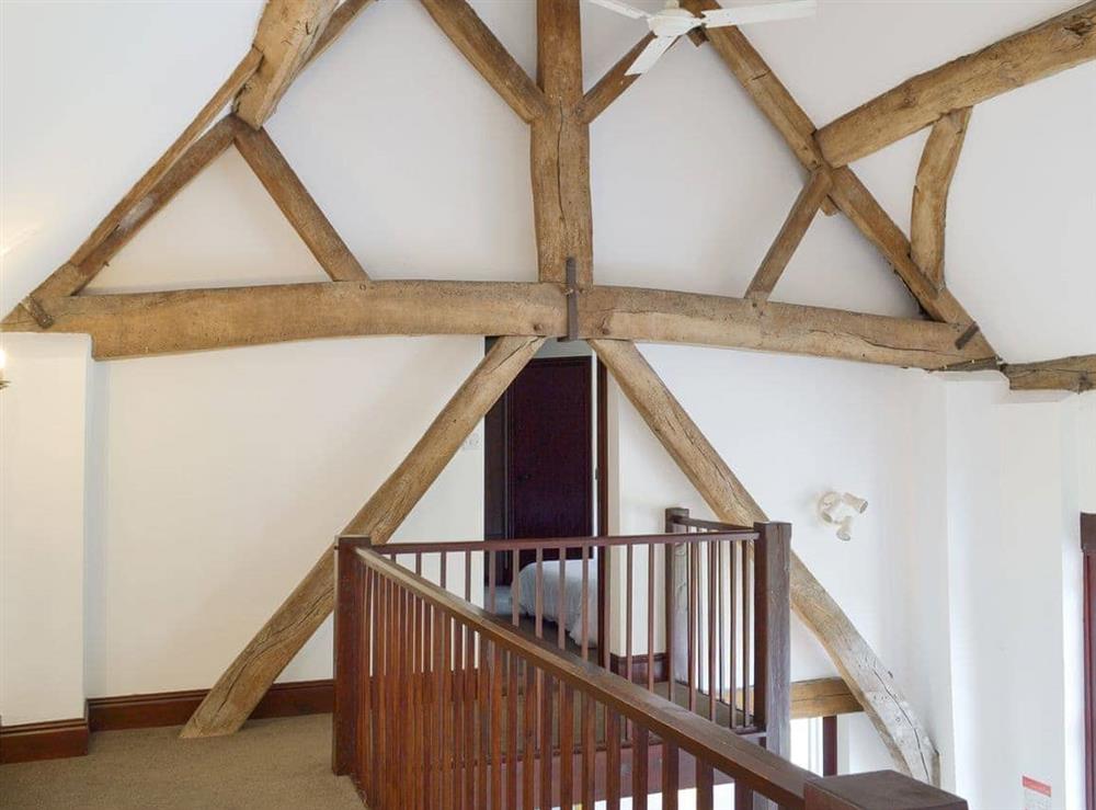 Galleried landing with characterful exposed beams at Foremark Threshing Barn, 
