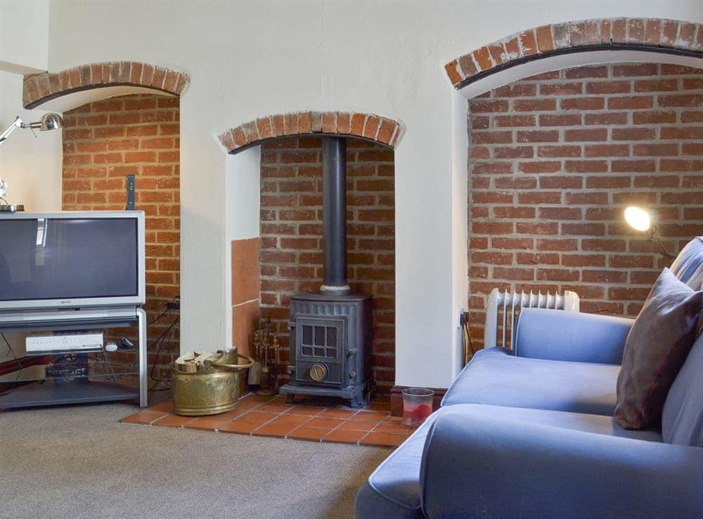 Characterful living room at Repton Cottage, 