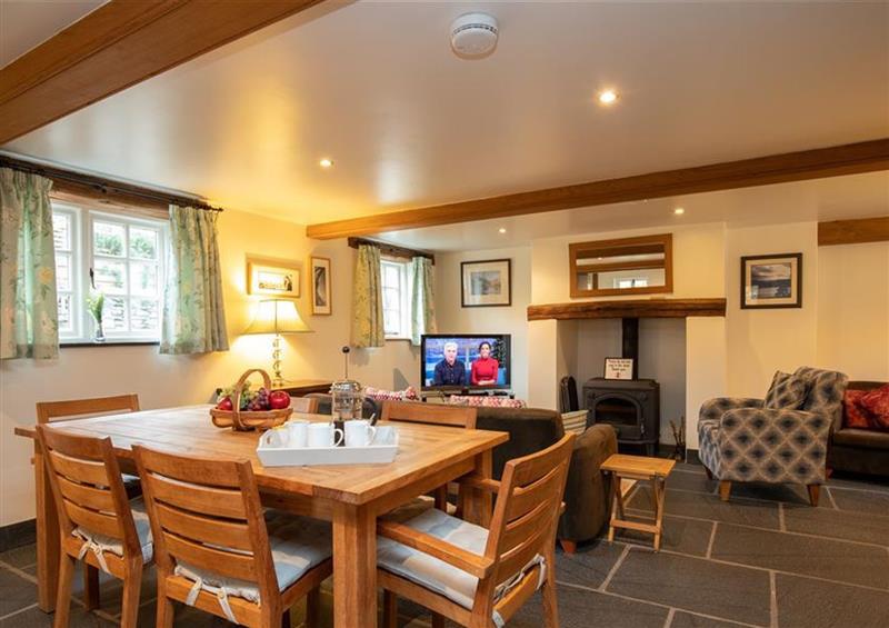 Relax in the living area at Forest Cottage, Coniston