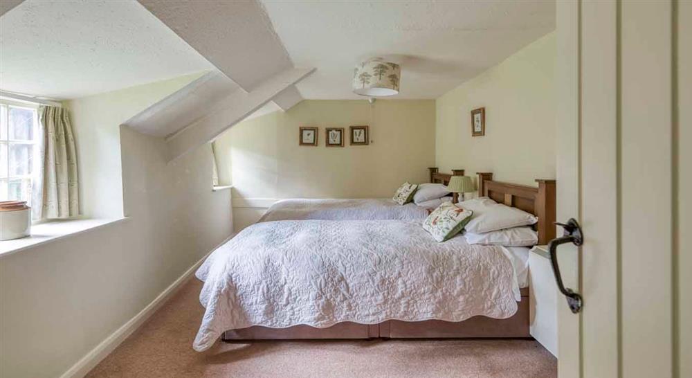 The twin bedroom at Forest Cottage in Exeter, Devon