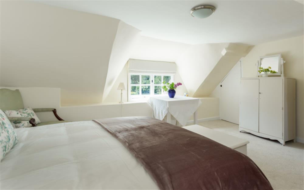 A bedroom in Forest Cottage at Forest Cottage in Pilley