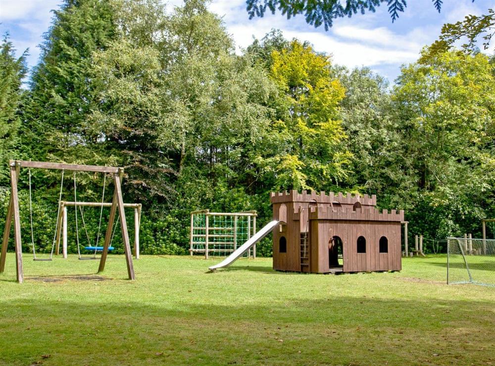 Children’s play area at Forest Glade Lodge in Lanlivery, Cornwall
