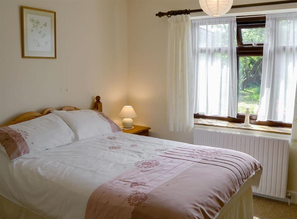 Comfortable double bedroom at Forge Cottage in Norwich, Norfolk