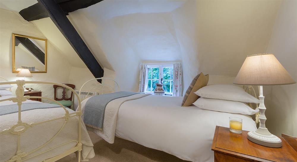 The twin bedroom at Forge Cottage in Seaton, Devon