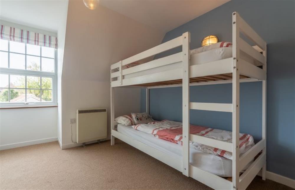 First floor:  Bedroom two with full size bunk beds at Forge Cottage, Thornham near Hunstanton