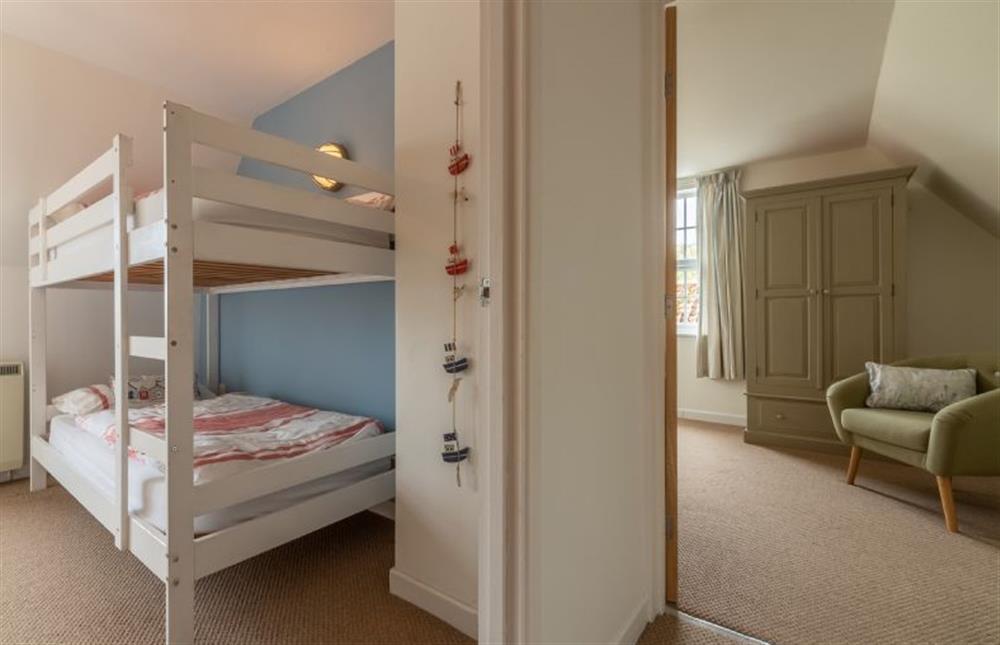 First floor:  Landing with door to bedroom two  at Forge Cottage, Thornham near Hunstanton