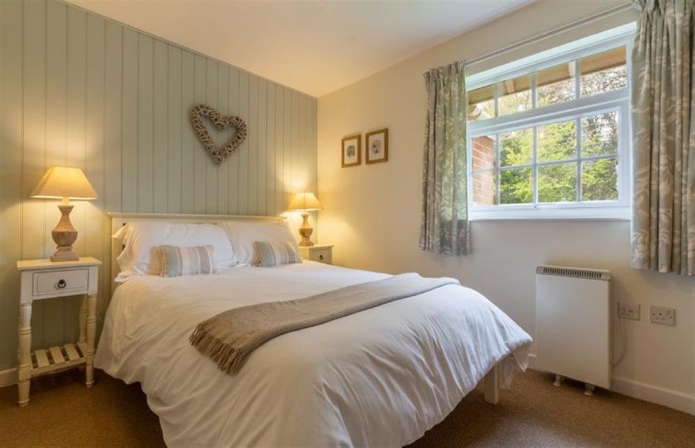 Ground floor: Bedroom three with double bed at Forge Cottage, Thornham near Hunstanton