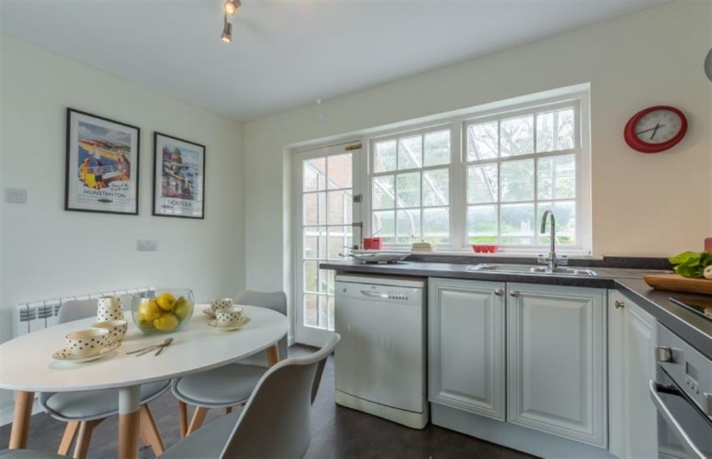 Ground floor: Kitchen with table and seating for four at Forge Cottage, Thornham near Hunstanton