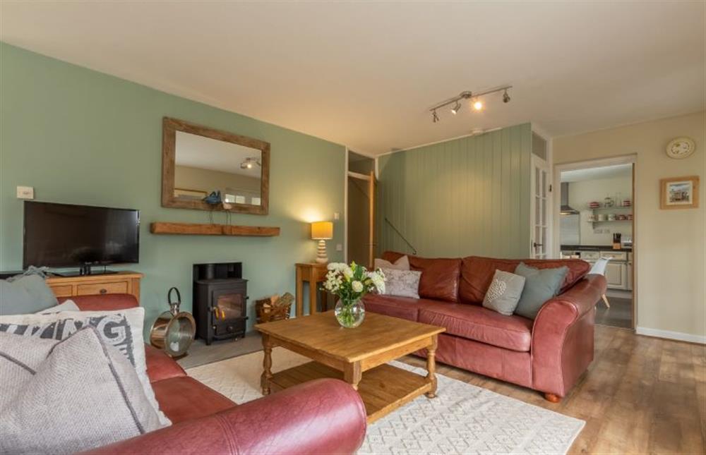 Ground floor: Sitting room with comfortable seating at Forge Cottage, Thornham near Hunstanton