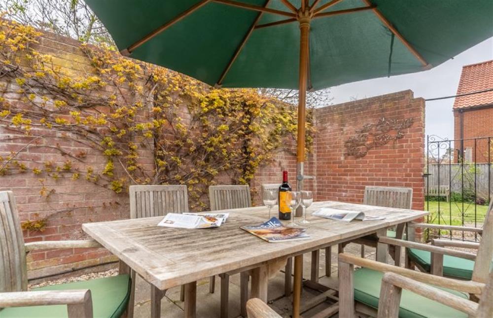 Side garden:  With table and seating for eight at Forge Cottage, Thornham near Hunstanton