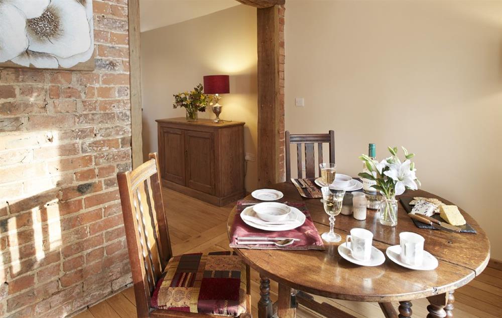 Dining area with antique table and chairs at Forge Croft, Skirpenbeck 