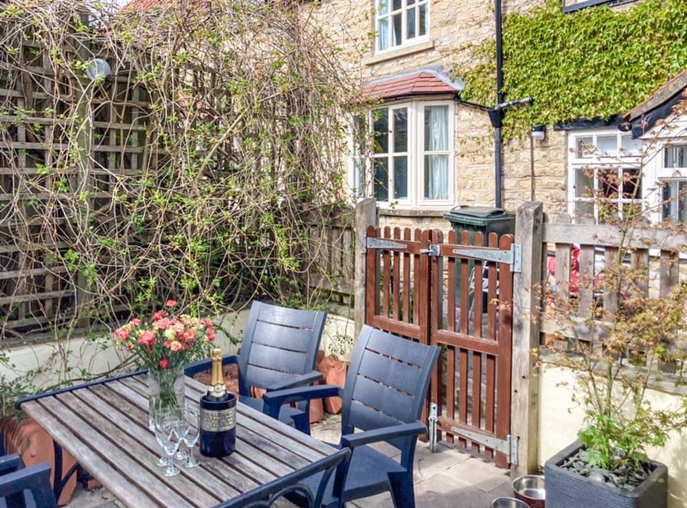 Enclosed courtyard at Forge View Cottage in Thornton-le-Dale, near Pickering, North Yorkshire
