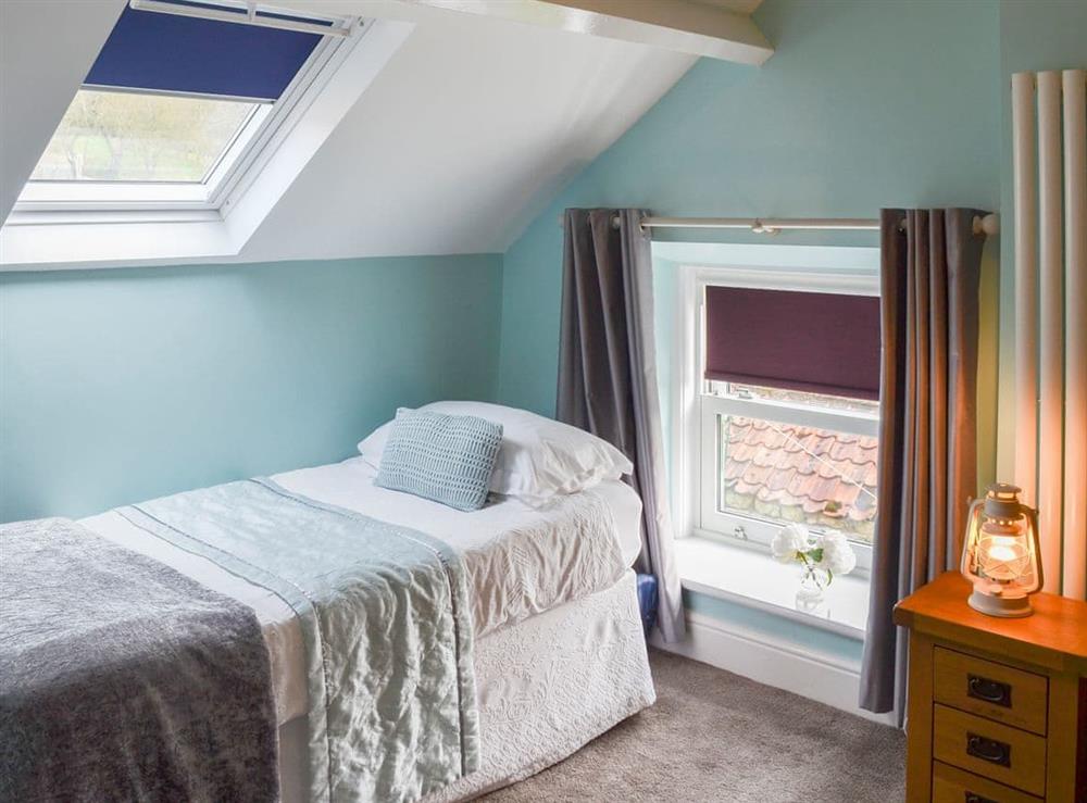 Bedroom with comfortable single bed at Forge Villa in Ebberston, near Pickering, North Yorkshire