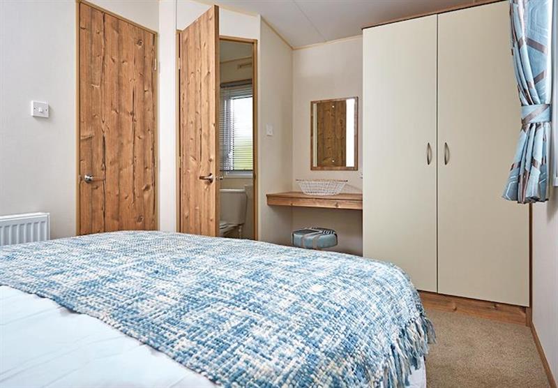 Bedroom in a Cheviot Standard Caravan at Forget Me Not Country Park in Long Horsley, Northumberland