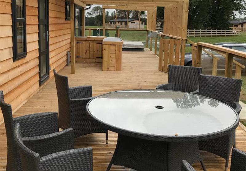 Decked area with the hot tub in Platinum at Fornham Park in Fornham Park, East of England