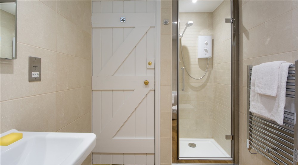 The walk-in shower in the ground floor bathroom at Fortescue in Lanteglos-by-fowey, Cornwall