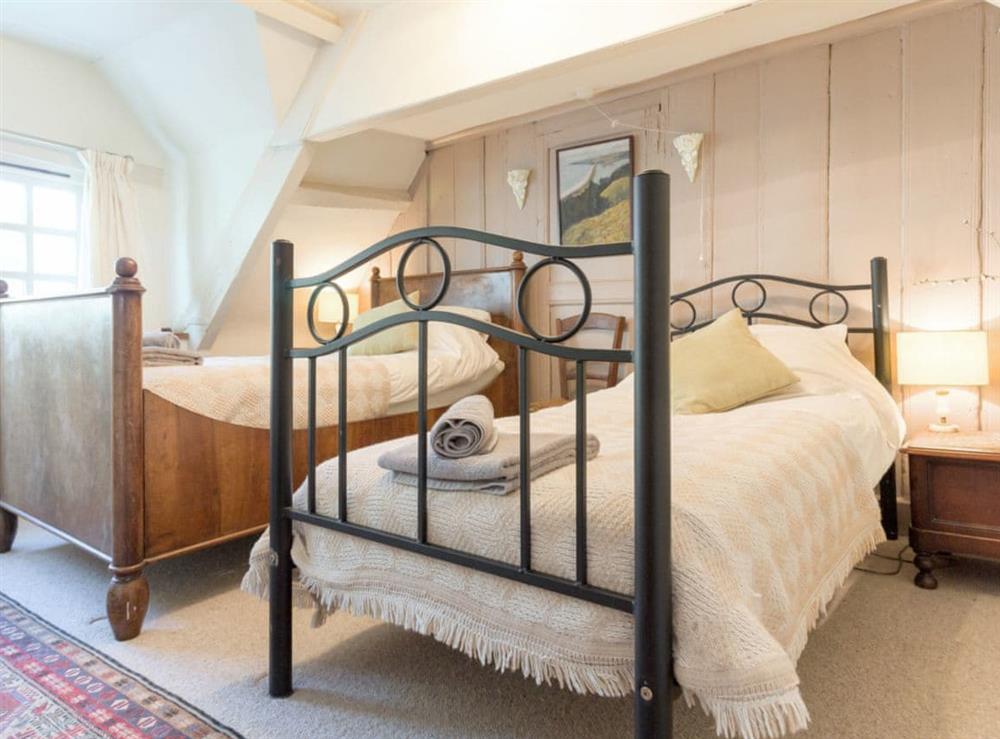 Comfy twin bedroom at Fossilers Lodge in Lyme Regis, Dorset