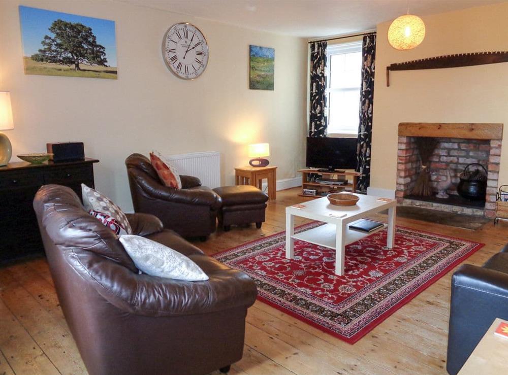Living room at Foston Grange Cottage in York, North Yorkshire