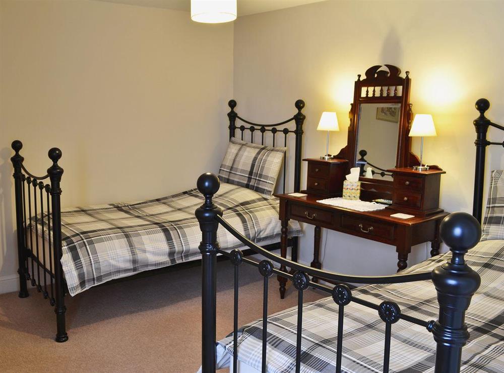 Twin bedroom at Foston Grange Cottage in York, North Yorkshire