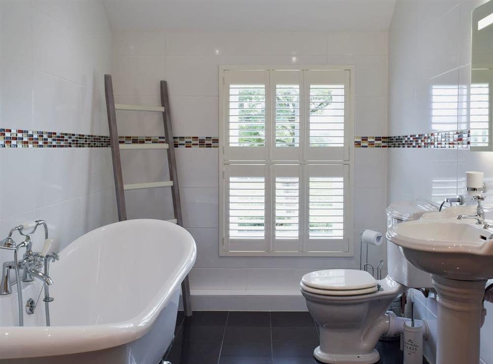 Family bathroom with roll-top bath at Fountain Hill in Eglwyswrw, near Cardigan, Pembrokeshire, Dyfed