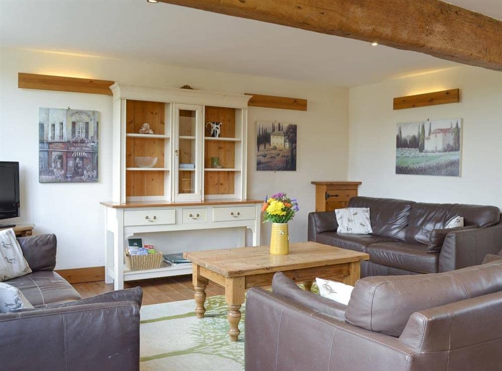 Welcoming living room with exposed wooden beams at Four Bays in Brandesburton, Nr Bridlington, East Yorkshire., North Humberside