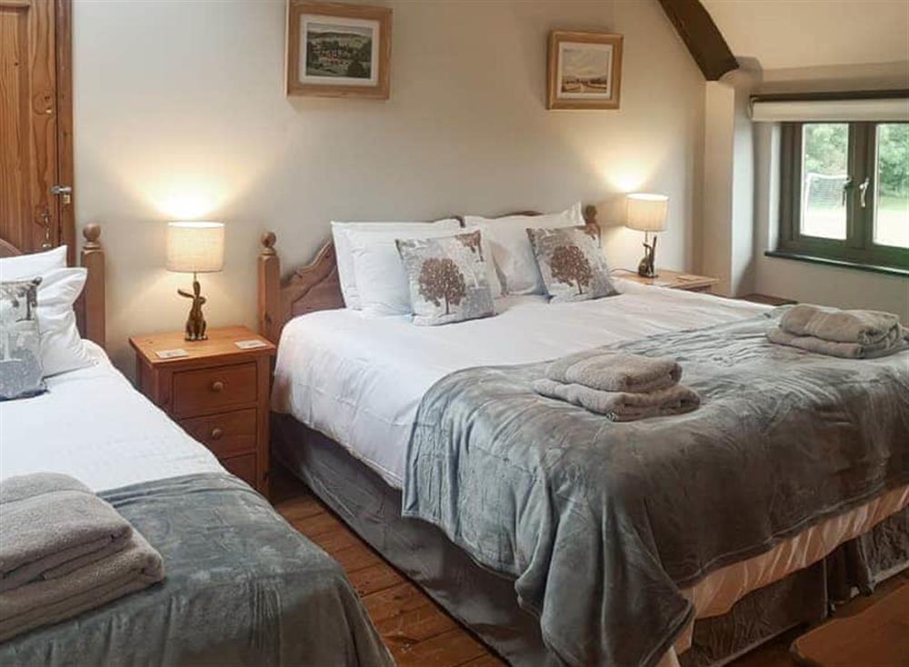 Family bedroom (photo 2) at Four Seasons Cottage in Torrington, Devon