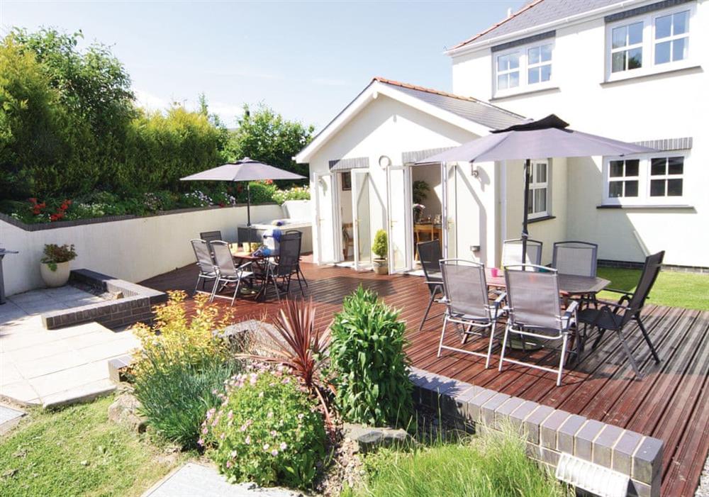 Four Seasons garden with decking at Four Seasons in Llandysul, Dyfed
