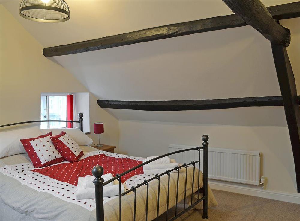 Second floor bedroom with king size bed, ensuite with shower and WC at Four Seasons in Pickering, North Yorkshire