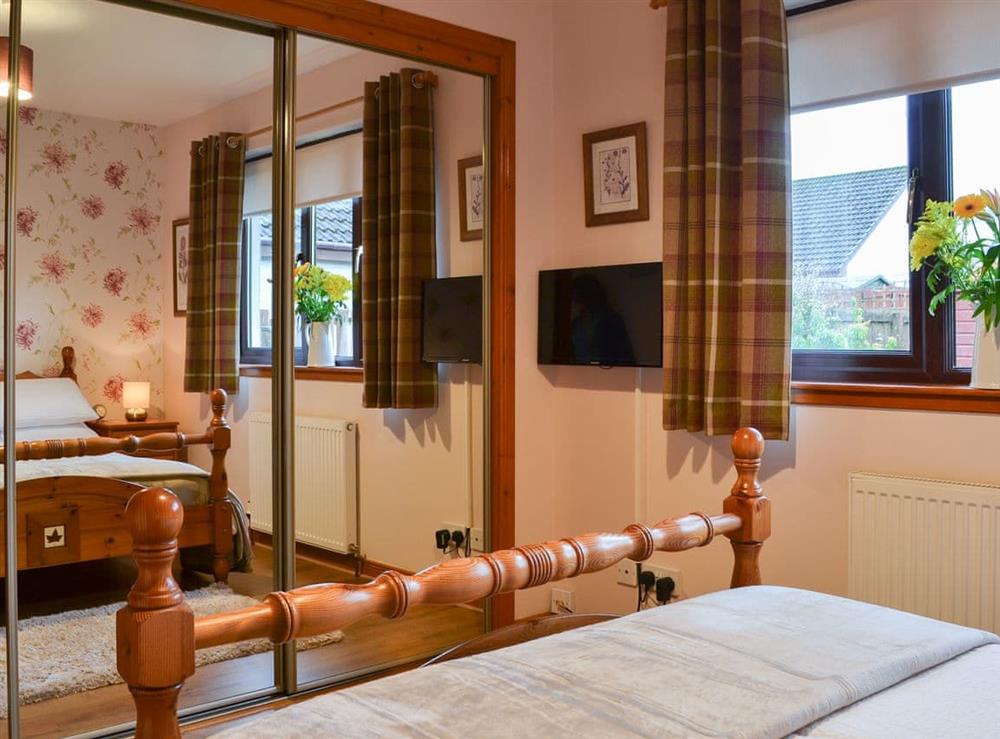 Double bedroom with plenty of storage space at Four Winds in Drumnadrochit, near Inverness, Inverness-Shire