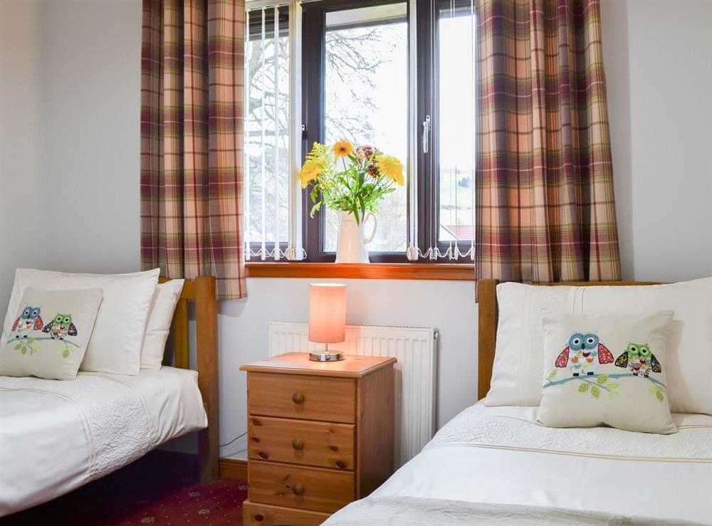 Pretty twin bedded room at Four Winds in Drumnadrochit, near Inverness, Inverness-Shire