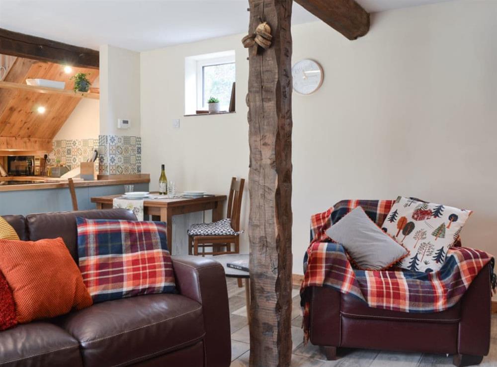 Cosy living room with wood beams & wood burner (photo 2) at Fourwinds in Farlow, near Ludlow, Shropshire