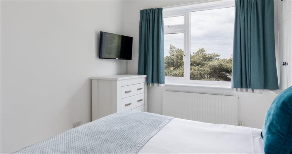 A bedroom in Fourwinds No.6 at Fourwinds No.6 in Sandbanks
